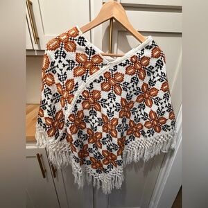 Fringed Floral Knit Cape in White and Orange